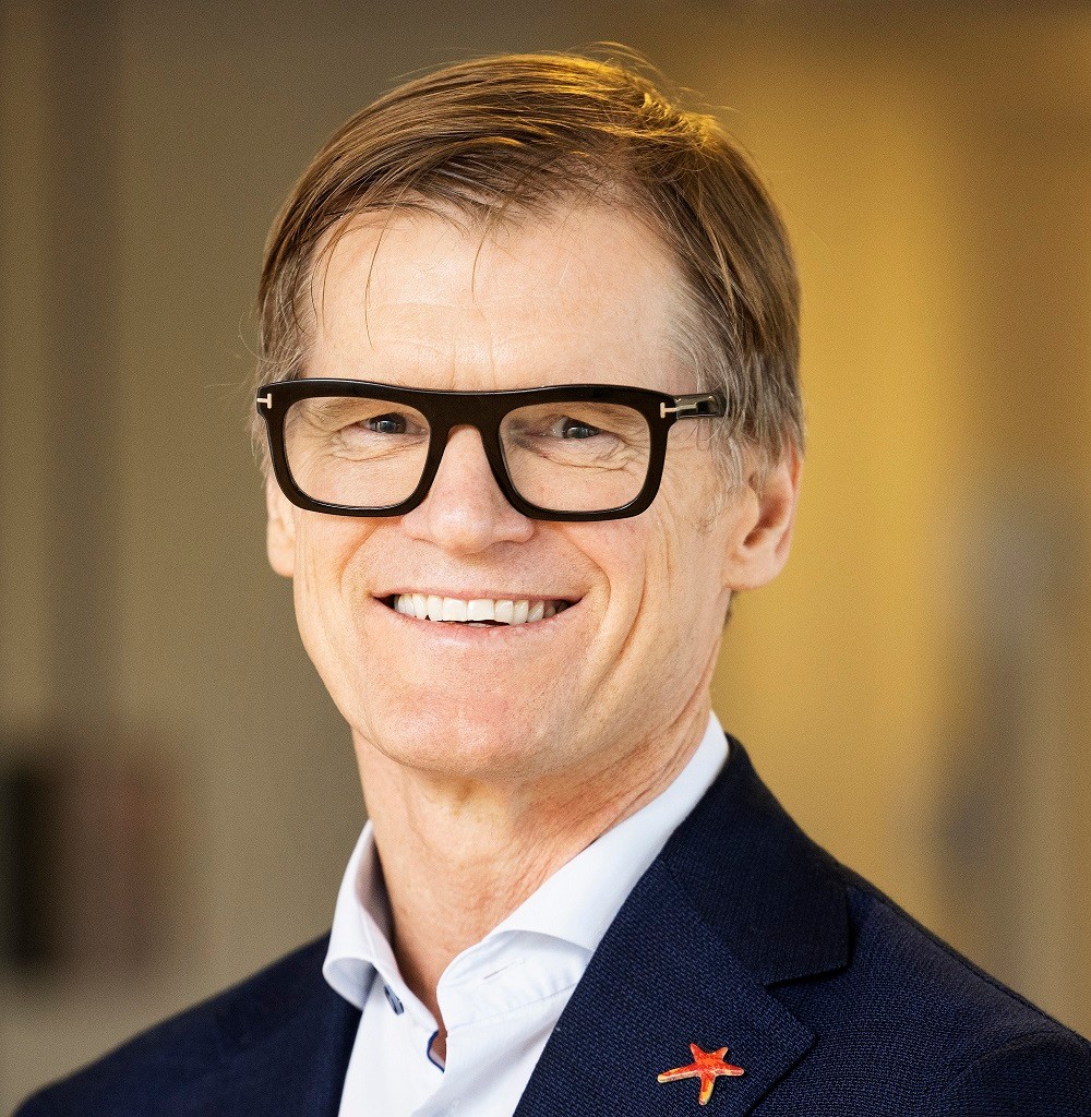 Charl van Zyl, President & CEO